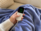Hand setting one of 9 heat levels on the SnugCloud LED controller