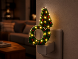 TwinkleTree plugged into a USB wall adapter, glowing
