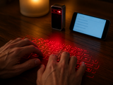 Typing on the LumiKey projected laser keyboard