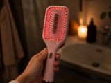 RootGlow brush with red LED ring glowing, close-up