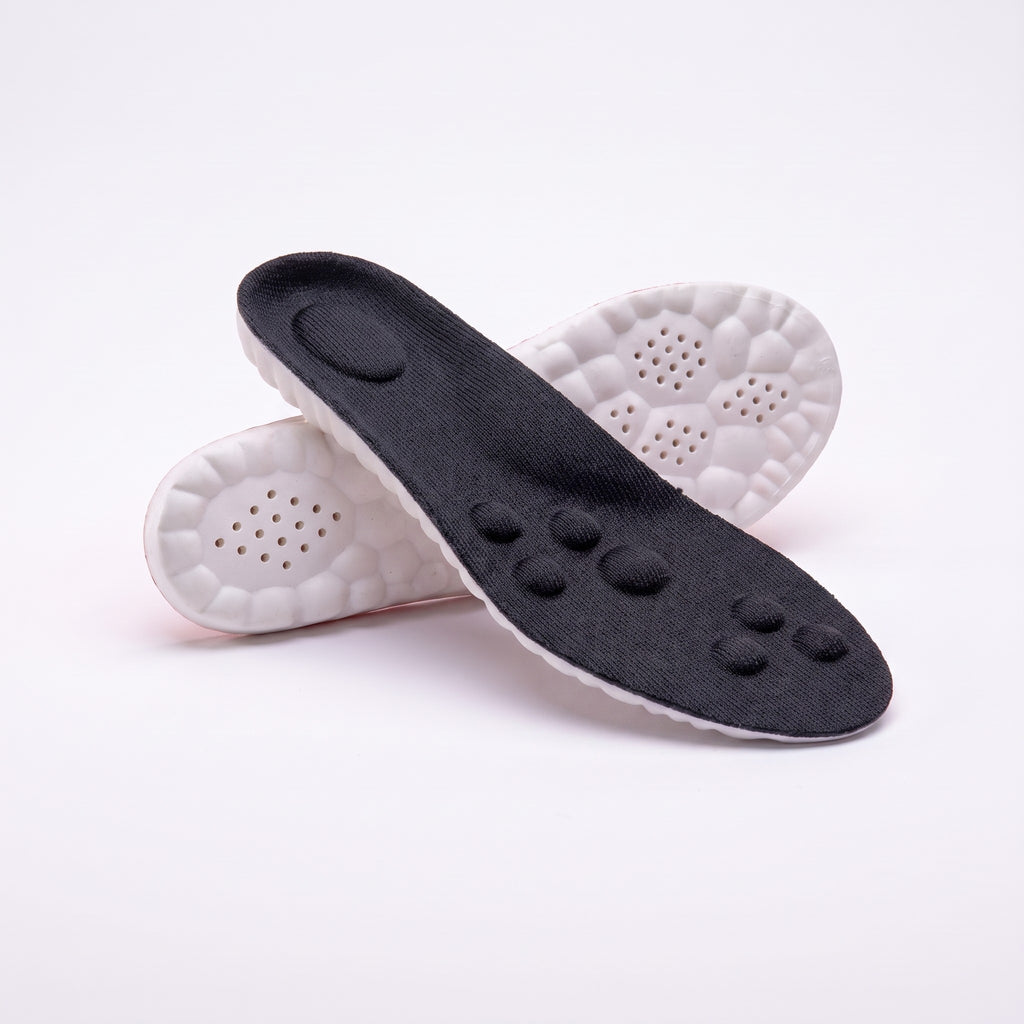 Black massage insoles, top and underside
